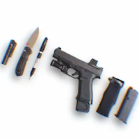 a gun, knife, and other items are laid out on a white surface